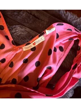 Pink dress with black polka dots
